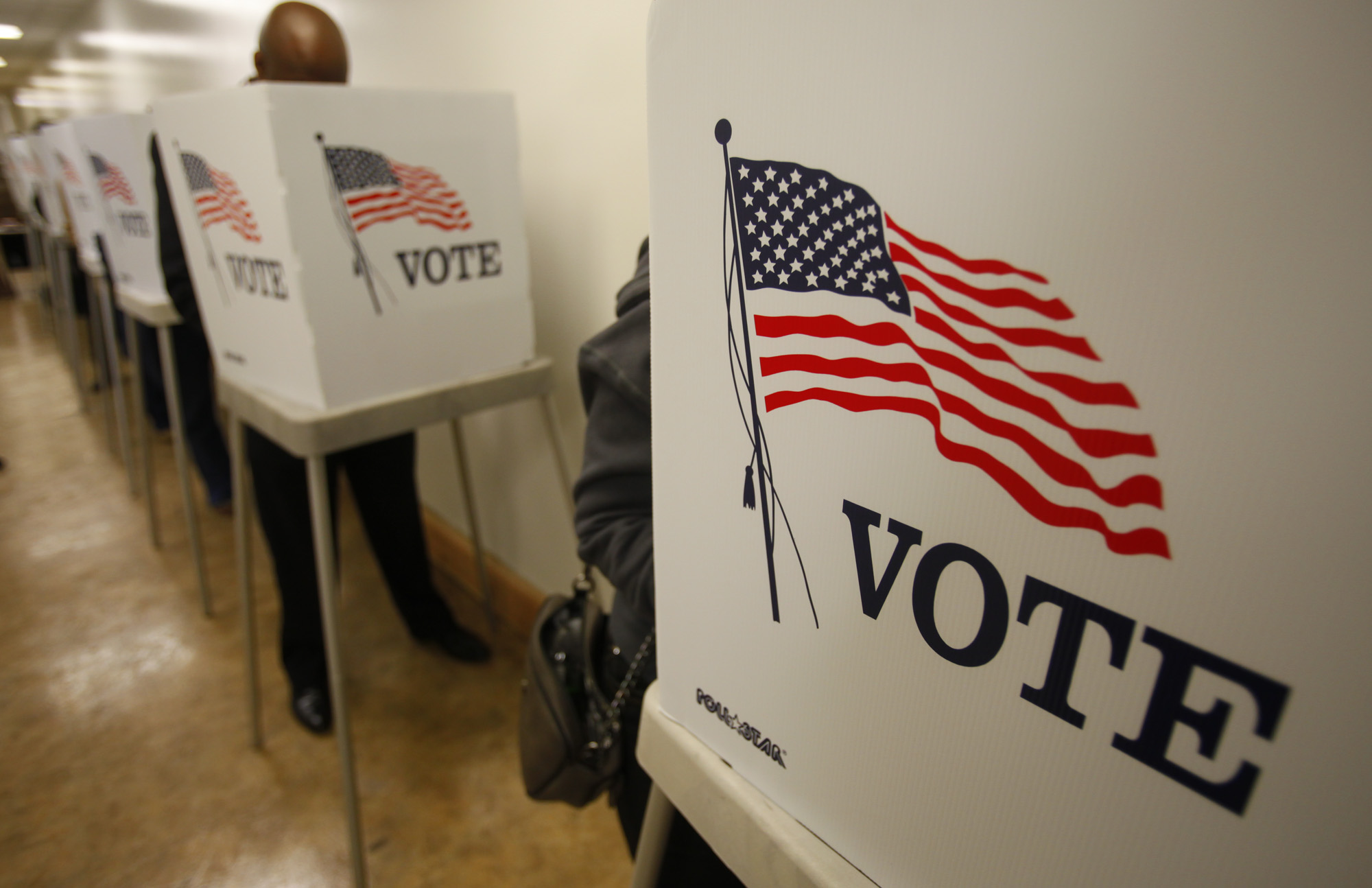 Early voters line-up before dawn at the Los Angeles County Registrar of Voters Office in Norwalk to