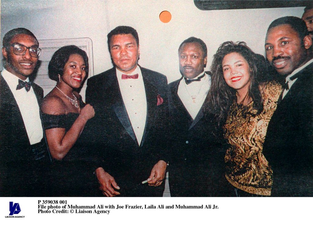 File picture of Khalia Ali, Muhammad's daughter. Here with her father and brother Muhammad Jr.