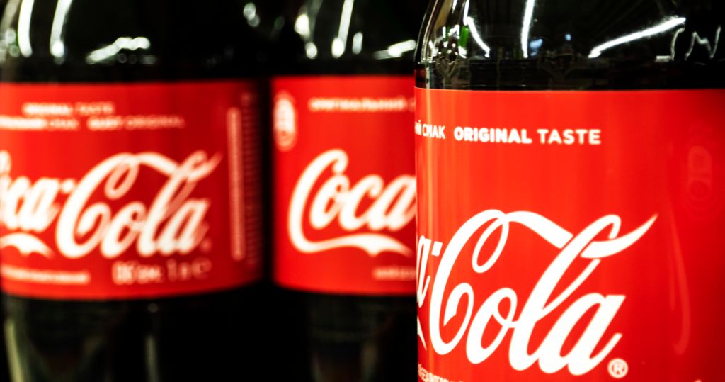 Row of Coca Cola bottles seen in store...