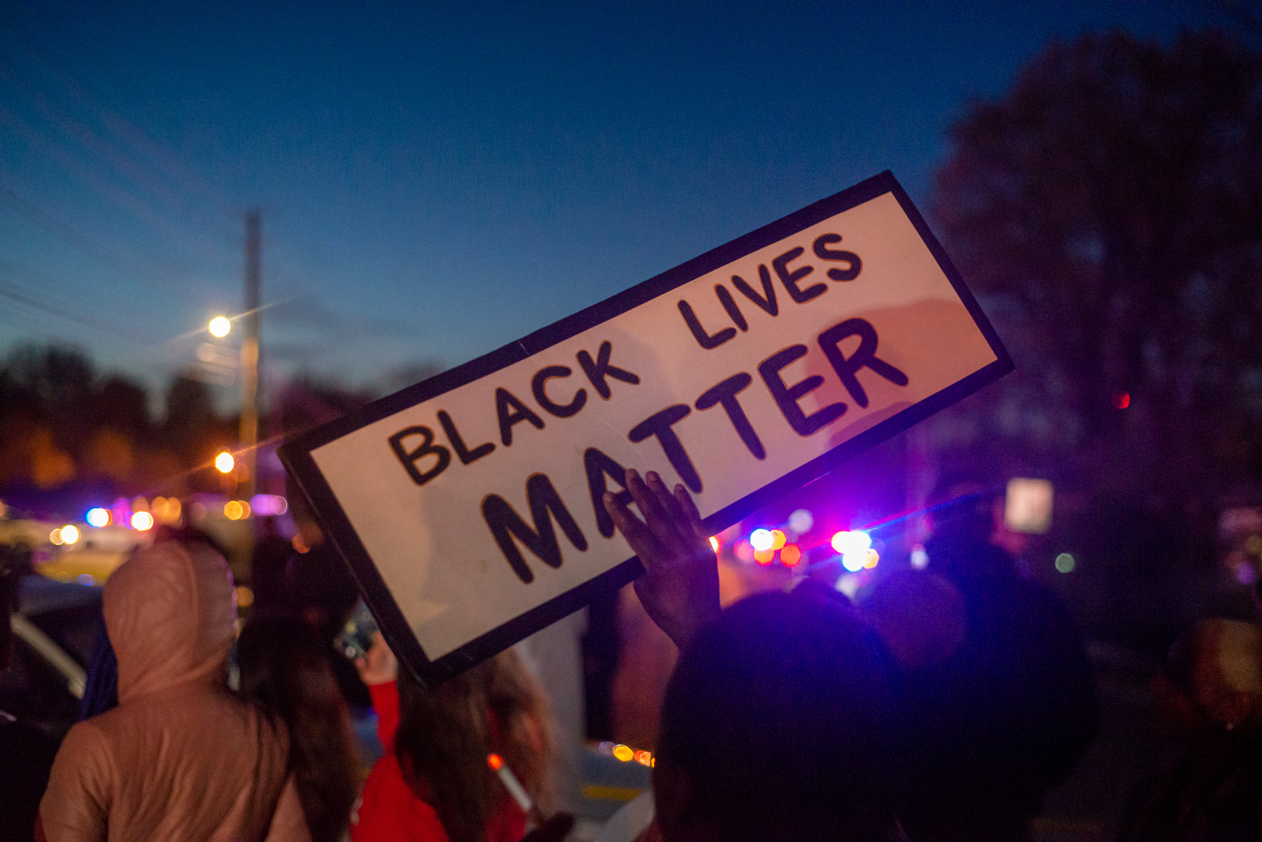 Protesters gather for Sean Reed