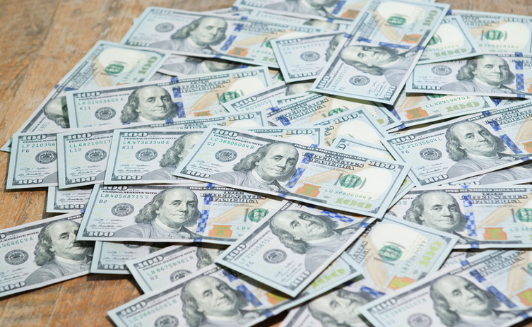 Stacking of US Dollar bank notes.