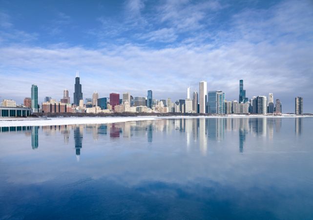Chicago city Skyline and frozen Lake Michigan in winter, Illinois, USA